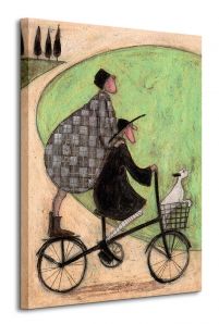 Obraz na płótnie przedstawia parę jadącą na rowerze