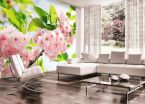 Piękne wnętrze mieszkania z fototapetą kwitnące wiśnie na ścianie